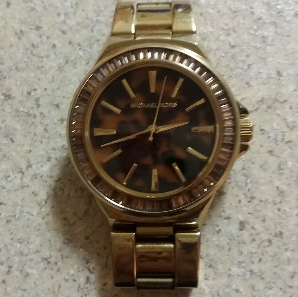 MK watch gold with cheetah print/tortuous face
